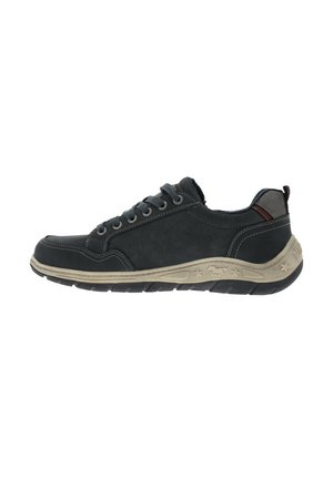 Black sneaker with a smooth upper, gray accents, and contrasting beige outsole featuring star patterns. Six eyelets for laces. Rounded toe shape.