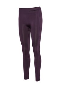 Purple seamless athletic leggings with textured patterns on thighs and sides, featuring a wide waistband and hummel logo near the waist.