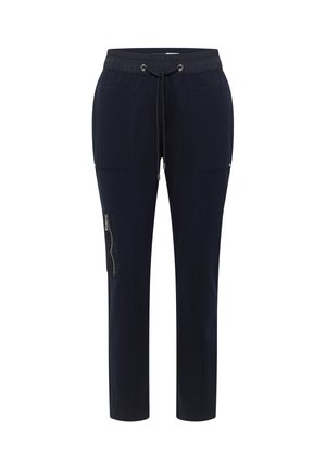 Pantalon bleu marine fuselé avec taille élastique, cordon de serrage, poches avant et poche latérale zippée sur la jambe gauche.
