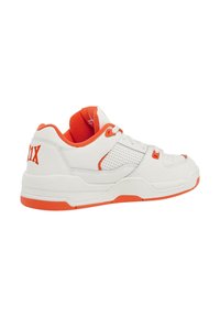 White leather sneaker with orange accents, featuring a perforated side panel, padded collar, and a bold logo on the heel.