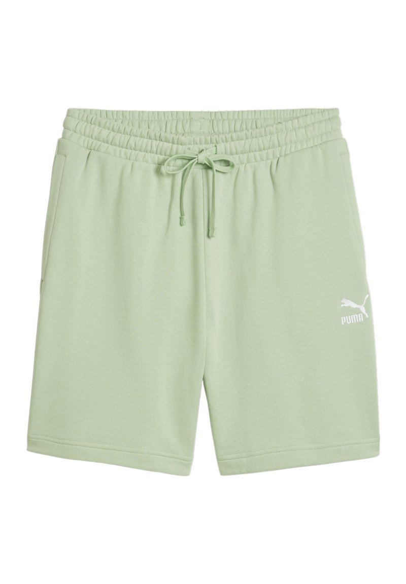 Lichtgroene katoenen shorts met een elastische tailleband en een trekkoord, voorzien van een wit Puma-logo aan de onderkant rechts.