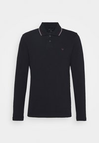 Svart långärmad polo med tvåknäppt knappslå, krage med vita och röda ränder, samt en liten röd logotyp på vänstra bröstet.