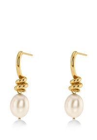 Gold earrings with twisted spiral design holding large white oval pearls, displayed on a white background.
