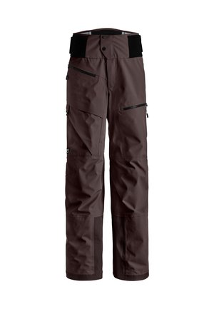 Brown insulated ski pants with a wide waistband, multiple pockets, and zip closures. Features reinforced lower legs with textured fabric accents.
