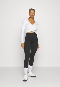 Björn Borg STUDIO SEAMLESS LIGHT - Trikoot - black beauty