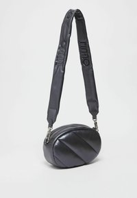 LIU JO GLOSSY QUILTED - Bandolera - black