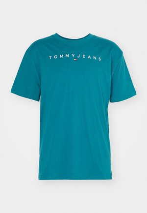 Søgrøn bomulds t-shirt med rund hals, korte ærmer og "TOMMYJEANS" logo trykt i hvidt på brystet, med et lille farvet emblem.