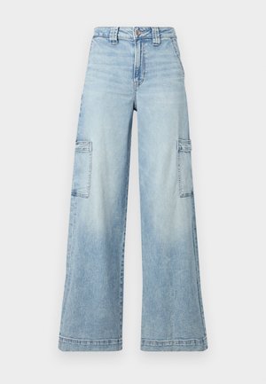 Jeans din denim de culoare albastră deschisă, cu croială largă, având două buzunare laterale, o talie înaltă și o ușoară decolorare pe întreaga țesătură.