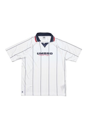 White short-sleeve polo shirt with navy stripes, a navy collar, and red accents. Features a v-neck and "UMBRO Football League" logo.