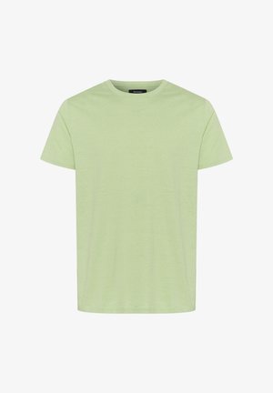 Hele rohelise puuvillane T-särk, ümar kaelus, lühikesed varrukad ja lõdva lõikega. Sile tekstuur, minimaalne disain ja ilma mustriteta.