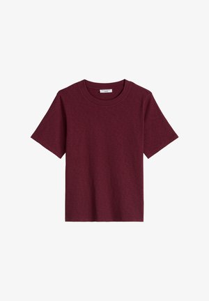 T-shirt met korte mouwen en een ronde hals in effen donker bordeauxrood, gemaakt van zachte katoenen stof.