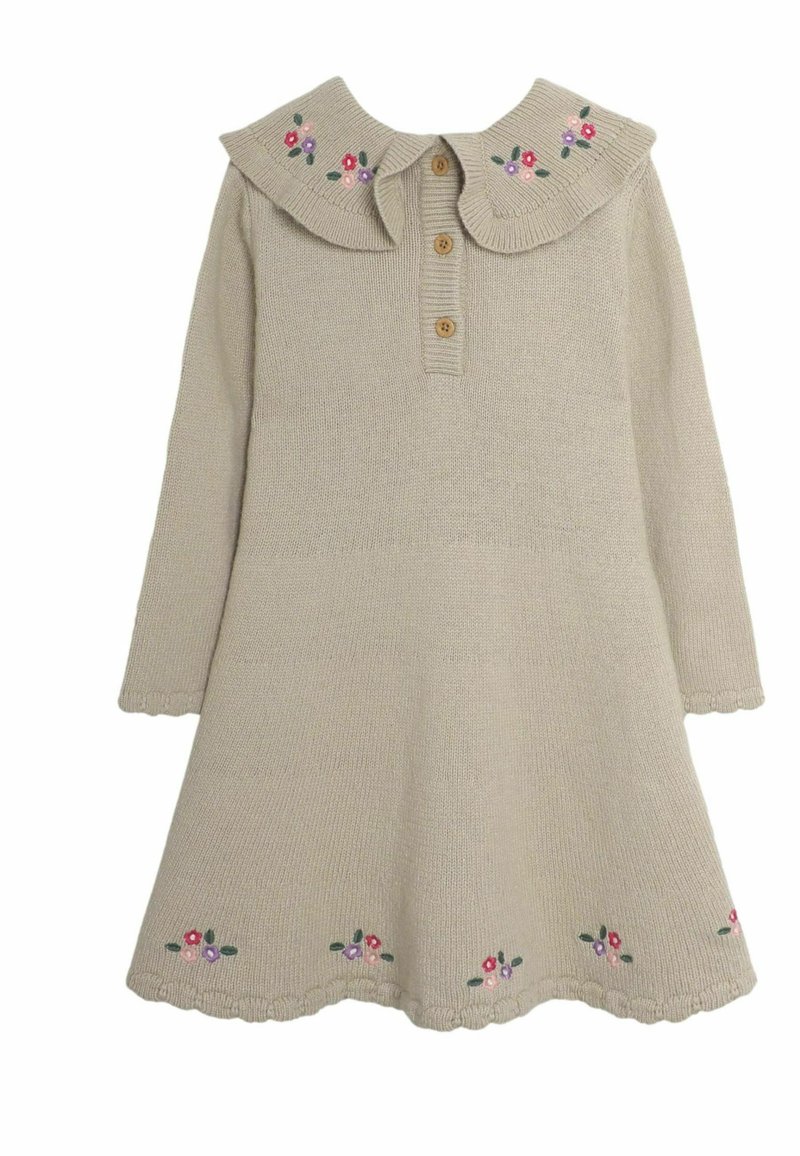 Beige gebreide jurk met een kraag, drie knopen en bloemendecoraties op de kraag en de zoom. Lange mouwen met golfrand.