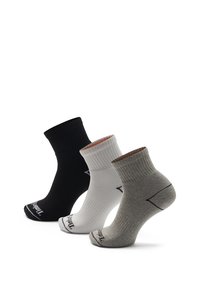 Knöchelsocken in Schwarz, Weiß und Grau. Rippstrickstruktur, verstärkte Ferse und Logoaufdruck an der Spitze. Jede Socke hat eine andere Farbe.