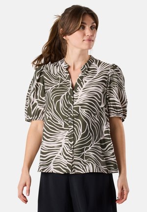 Short-sleeve blouse in olive green with a white leaf pattern, featuring a button closure and a relaxed fit with pleated sleeves.