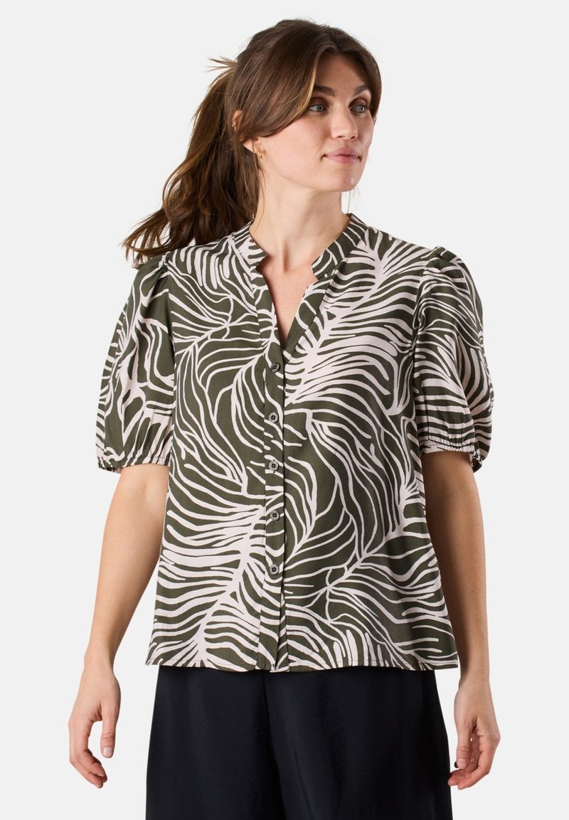 Short-sleeve blouse in olive green with a white leaf pattern, featuring a button closure and a relaxed fit with pleated sleeves.