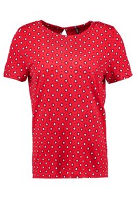 T-shirt rossa a maniche corte con scollatura rotonda e dettaglio a chiave sulla schiena, caratterizzata da un motivo geometrico bianco e blu. 