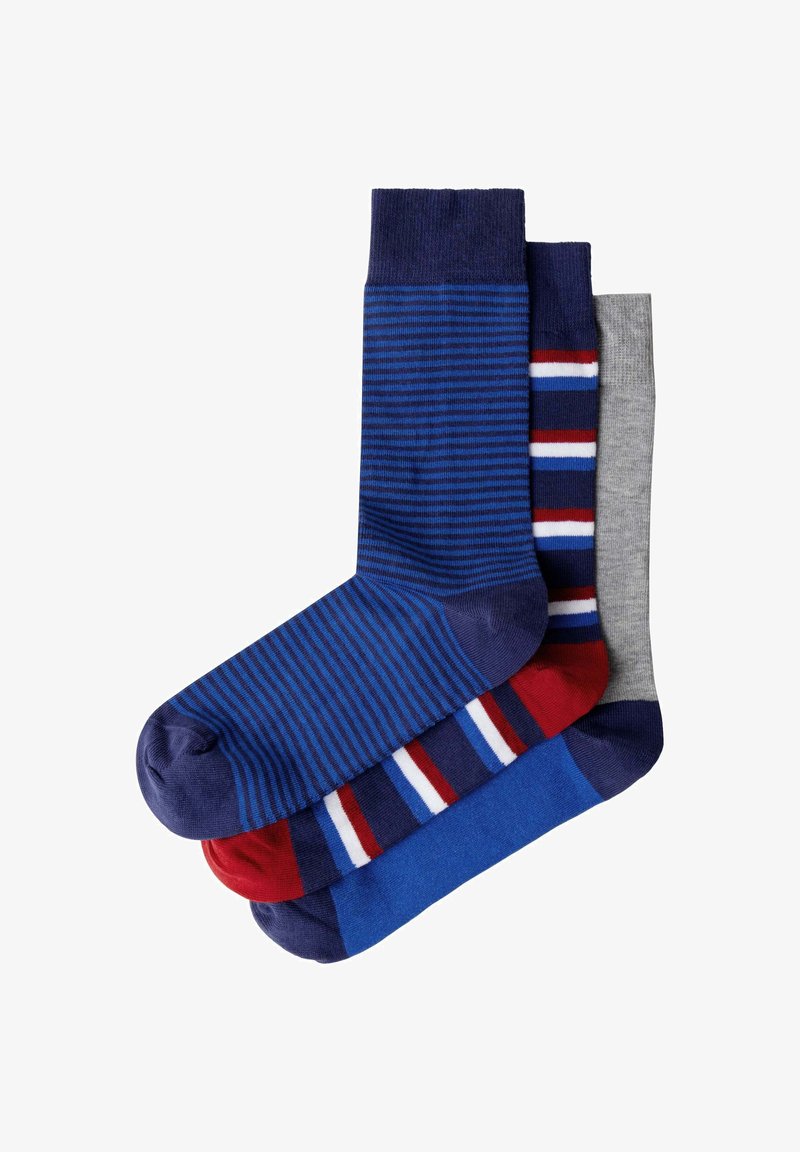 Trois paires de chaussettes hautes pour hommes : une marine avec de fines rayures bleues, une marine avec des rayures rouge, blanc et bleu, et une grise unie.