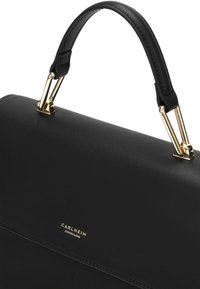 Black leather handbag with a structured shape, featuring a short handle, gold-tone hardware, and subtle branding embossed on the surface.