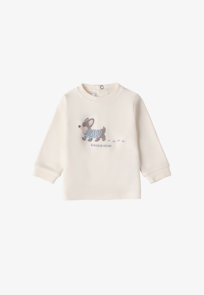 Camisa de manga larga color crema hecha de una tela suave, que presenta un divertido dibujo de un perro con una camisa a rayas azules y huellas de patas.