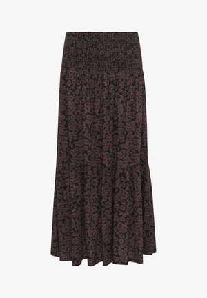 Maxihame tumāna ki te tāpare pua pouri me te pēra smocked. He āhuatanga tiered, i hangaia mai i te kōwhai māmā me te āhua horihori.