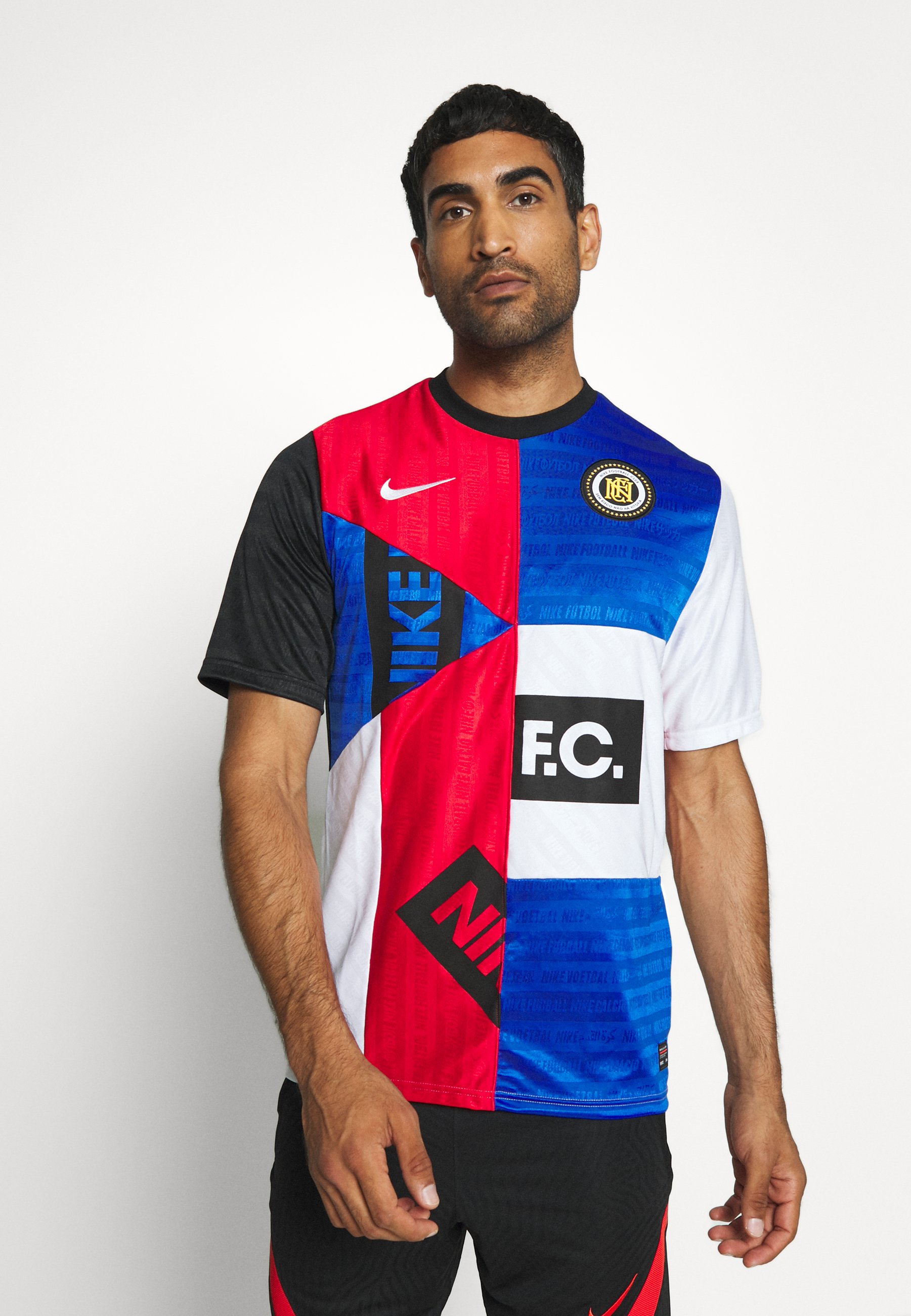 royal blue and red nike shirt