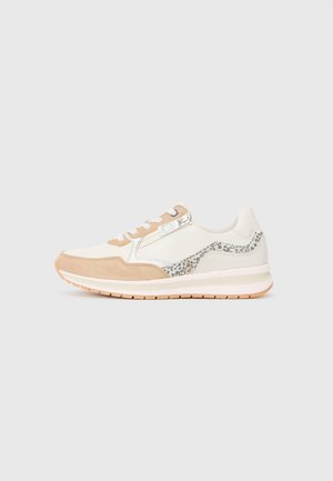 Athletic shoe with a beige and white upper, suede and mesh materials, leopard print accents, rubber sole, and flat laces.
