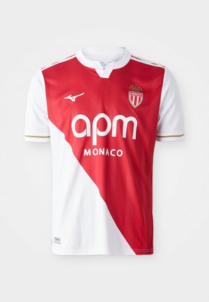 Rood en wit voetbalshirt met korte mouwen, voorzien van een diagonale kleurblok, gouden accenten, merklogo en embleem. Lichtgewicht, ademend stof.