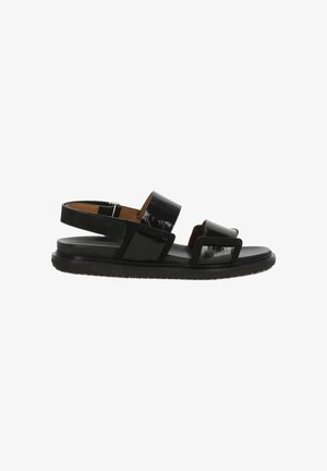 Sandalo nero piatto con tre cinturini regolabili lucidi e cinturino sul tallone, progettato per una calzata aperta e confortevole.