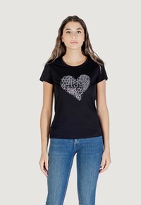 Zwarte katoenen t-shirt met korte mouwen met een hartontwerp van kleine patroonvormen. Strakke snit met een ronde hals.