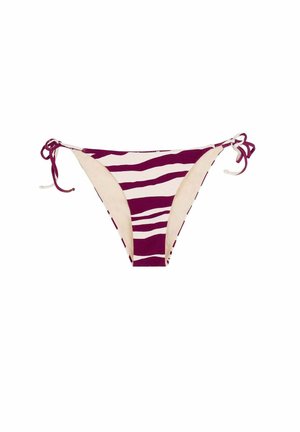 Parte inferior de bikini con rayas de cebra en púrpura y blanco con lazos laterales sobre un fondo blanco liso.
