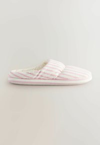 White slipper with pink stripes, soft fabric upper, cushioned interior, low profile, and rubber sole. Seamless design with no hardware visible.