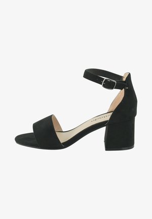 Black suede block-heeled sandal with an ankle strap and open toe, featuring a wide front band and a smooth, minimalist design.