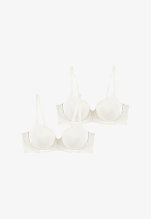 Dos sujetadores blancos con copas moldeadas y lisas, tirantes ajustables y diseño sin costuras. Tejido suave con detalles mínimos. Sin aros.