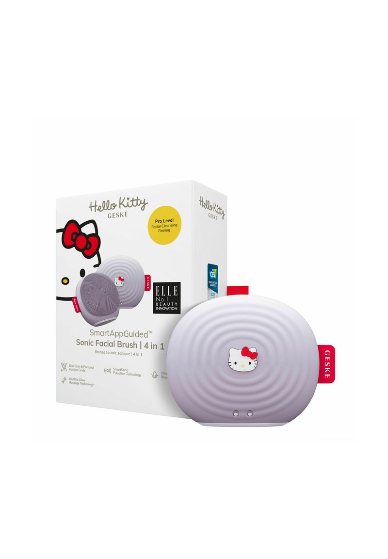Hello Kitty Sonic Facial Brush i ljuslila, oval form med ribbad textur, med ett dekorativt karaktärsansikte och röda detaljer.
