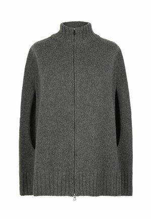 Pull en tricot gris avec un col montant, fermeture éclair avant sur toute la longueur et poignets côtelés. Présente des côtés ouverts et une surface texturée. Matière douce en mélange de laine.