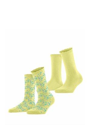Due paia di calzini gialli, uno di colore uniforme e uno con un motivo floreale blu, entrambi con polsini smerlati.