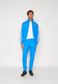 adidas Originals REAL MADRID ICON TRACK TOP - Klubové oblečení - bluebird/white