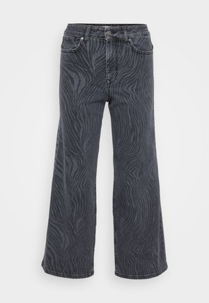 Wijde pijpen jeans in donkergrijze denim met een zebraprintpatroon. Klassiek ontwerp met vijf zakken, voorzien van een knoop- en ritsluiting.