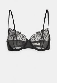 Reggiseno in pizzo nero con ricami floreali trasparenti, bordi scallop e spalline sottili regolabili. La base è di un nero solido con una texture liscia.