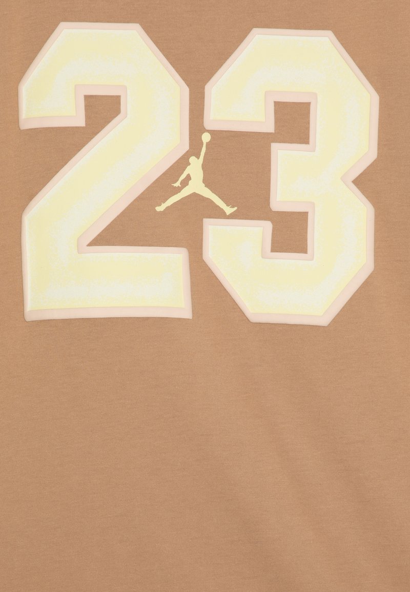 white and gold jordan t shirt