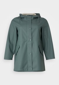 Green waterproof raincoat with a hood, featuring snap buttons, two side pockets, and a smooth texture. Contains visible stitching details.