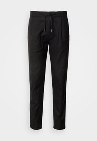 Pantalon noir fuselé avec ceinture à cordon en tissu et poches latérales, présenté sur fond blanc.