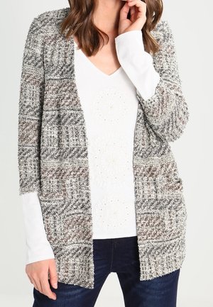 Stickad tröja - beige