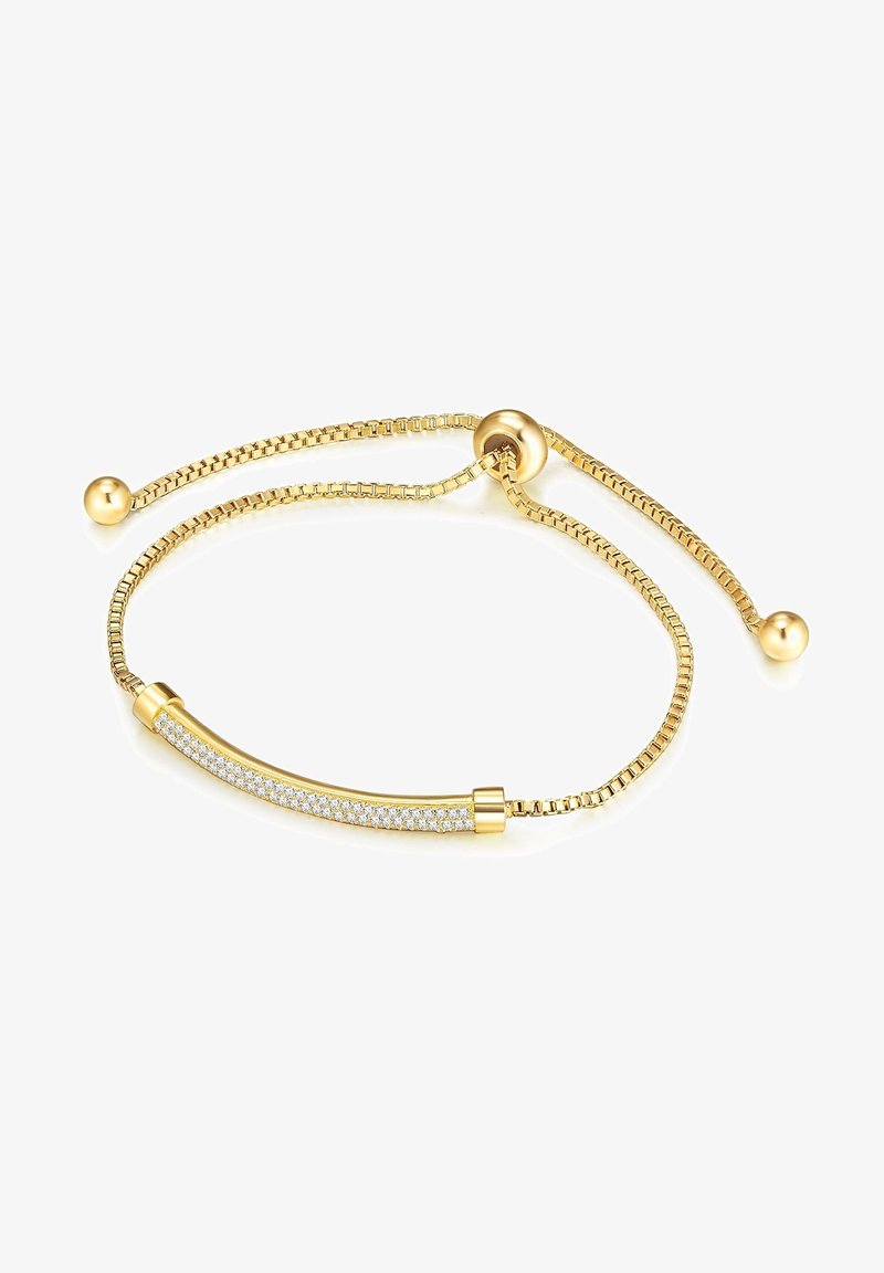 Aukso reguliuojama apyrankė, kurios centre yra elegantiška kreiva juosta, papuošta ryškiai blizgančiais skaidriais kristalais, ant tekstūruoto grandinėlės su suapvalintais galais.