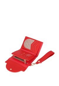 Red leather wallet with a wrist strap, featuring a zippered compartment and card slots. Inside has a textured pattern and ID window.