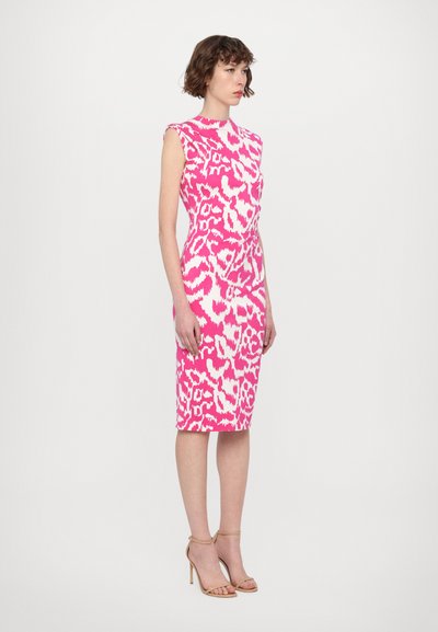 Fitted sleeveless dress in bright pink with white abstract leopard pattern, knee-length design, smooth texture, paired with strappy gold heels.