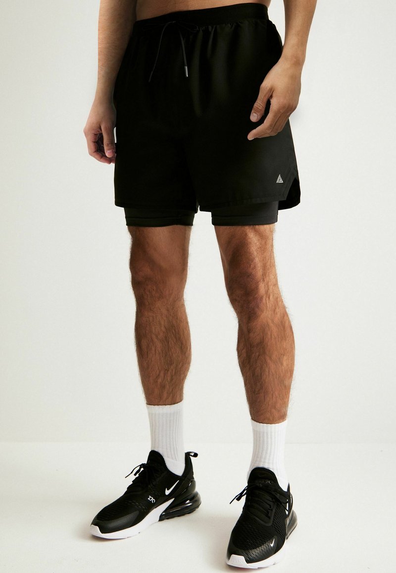 Next 2-IN-1 TRAINING - Shorts - black