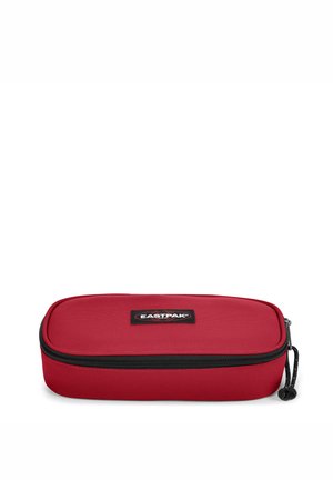 Red rectangular pencil case made of durable fabric with a black zipper and a logo patch on the front. Smooth texture, compact design.