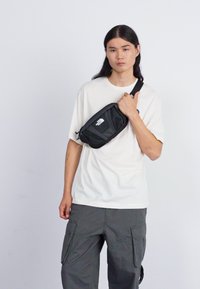 The North Face PACK UNISEX - Heuptas - black/asphalt grey