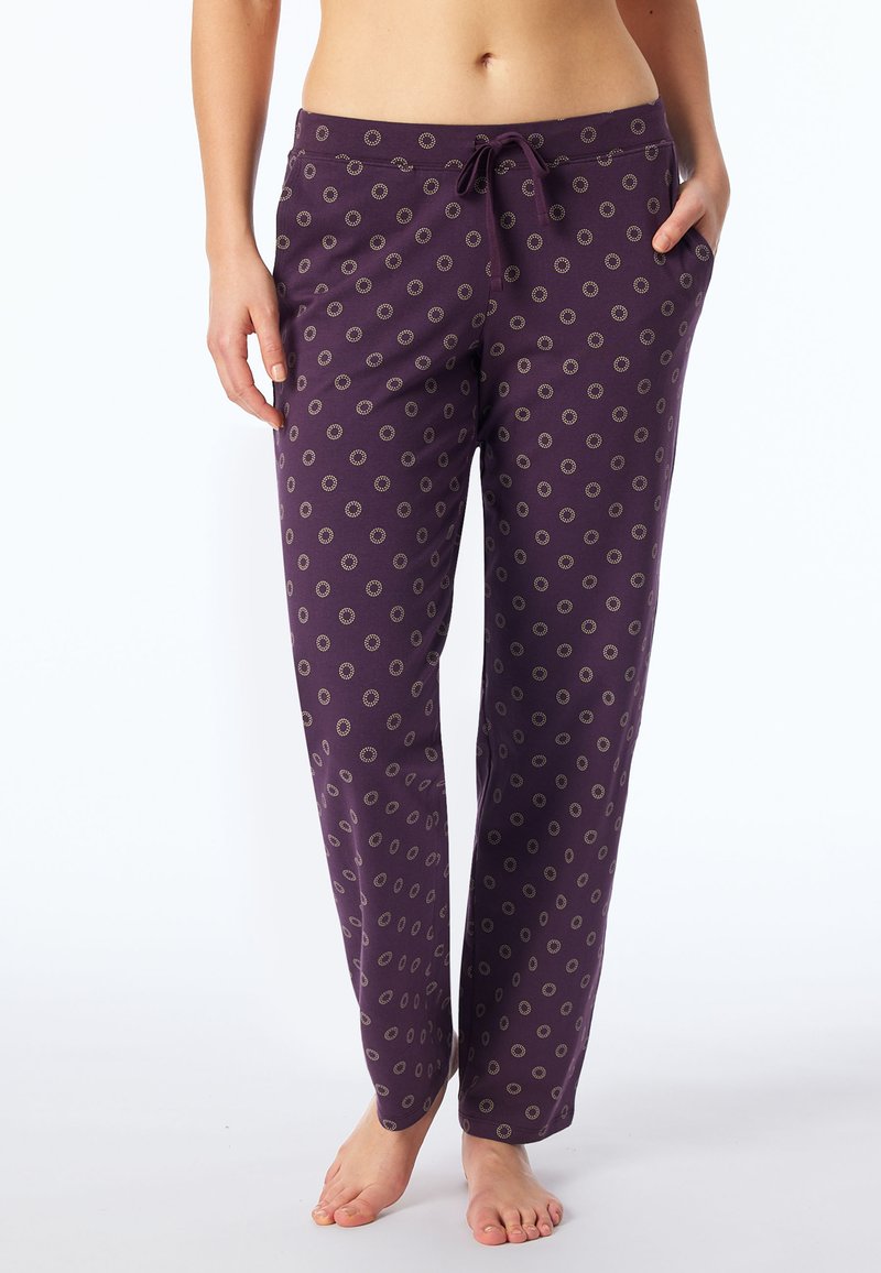 Pantaloni del pigiama viola con vita regolabile, caratterizzati da un motivo di piccoli disegni circolari in oro. Realizzati in un tessuto morbido e leggero.